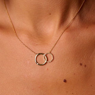 Pozlacený stříbrný náhrdelník Hot Diamonds X Golden Edit Interlocking DN252